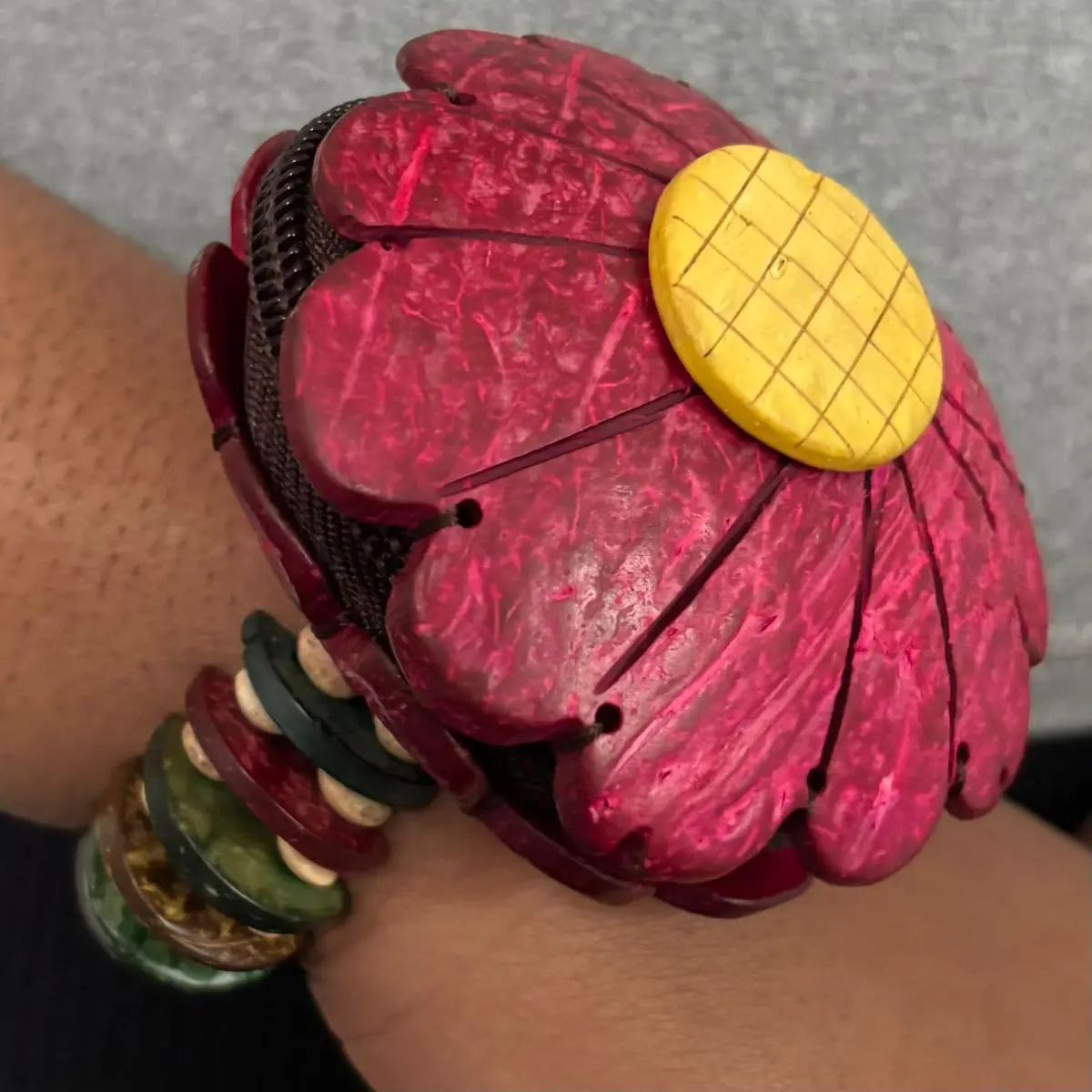 A red wooden coin purse for kids