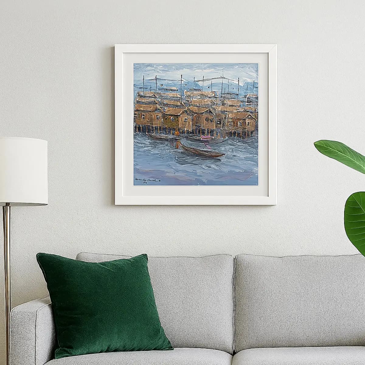 A framed oil painting of the Makoko