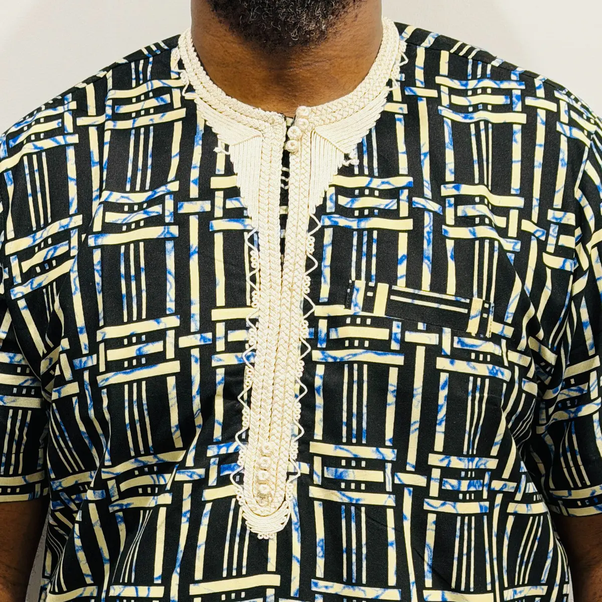 Handmade Ankara shirt with vibrant African print and chest pocket